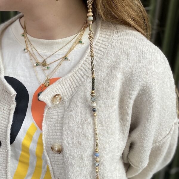 Kundin mit ihrem Trenza / Haarschmuck